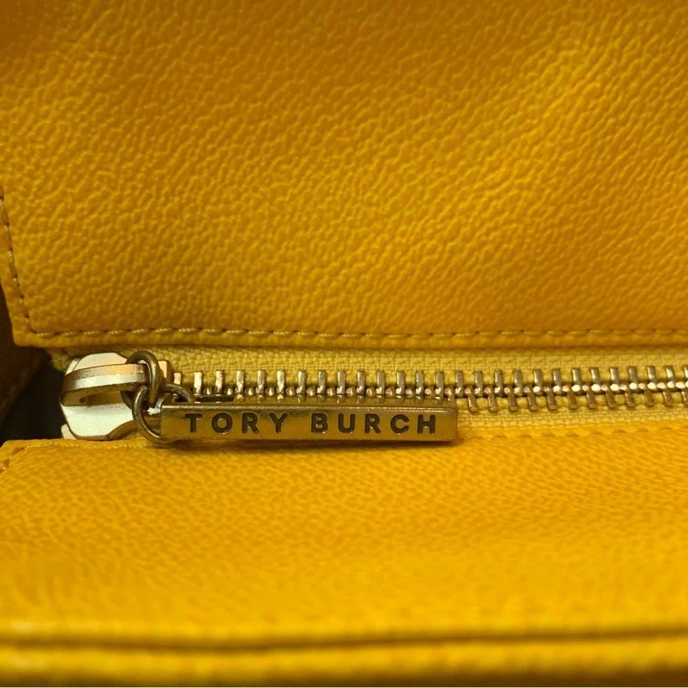 TORY BURCH. Yellow Leather Pebbled Roslyn‎ bag w/ stripes & a Logo accent.